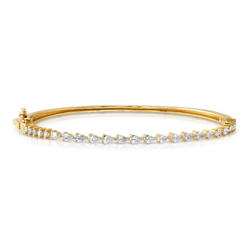 Pear diamond bangle, 14kt gold