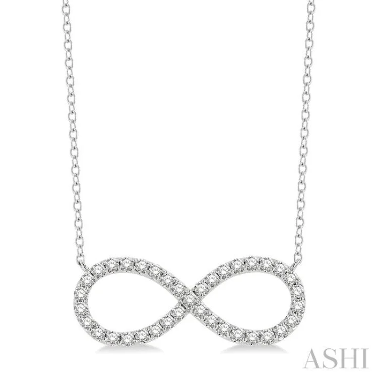 Ladies silver heart necklaces-3/4 Ctw Round Cut Diamond Infinity Necklace in 14K White Gold