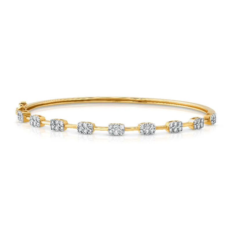 9 DIAMOND STUDDED BANGLE, 14kt GOLD